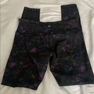 Lululemon full length black floral print leggings.